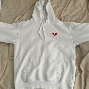 White Zuni Sportswear hoodie with red heart break design.